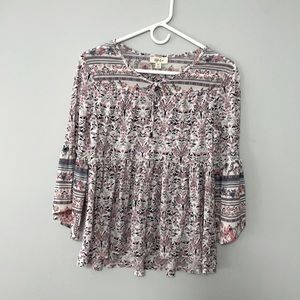 Girl’s XS floral blouse.